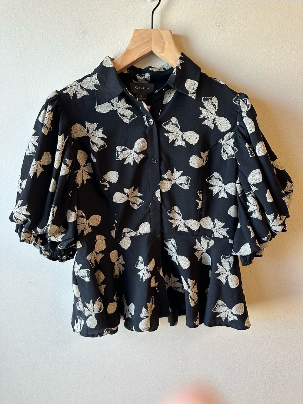 Gracia Black Peplum Blouse with Cream Bow Print and Puff Sleeves